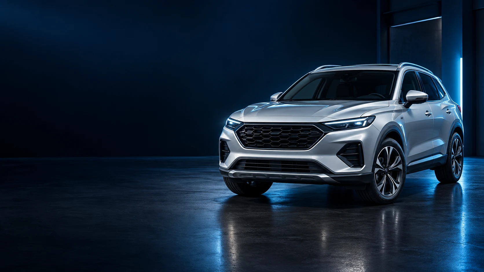 SUV prateado em um ambiente iluminado em azul